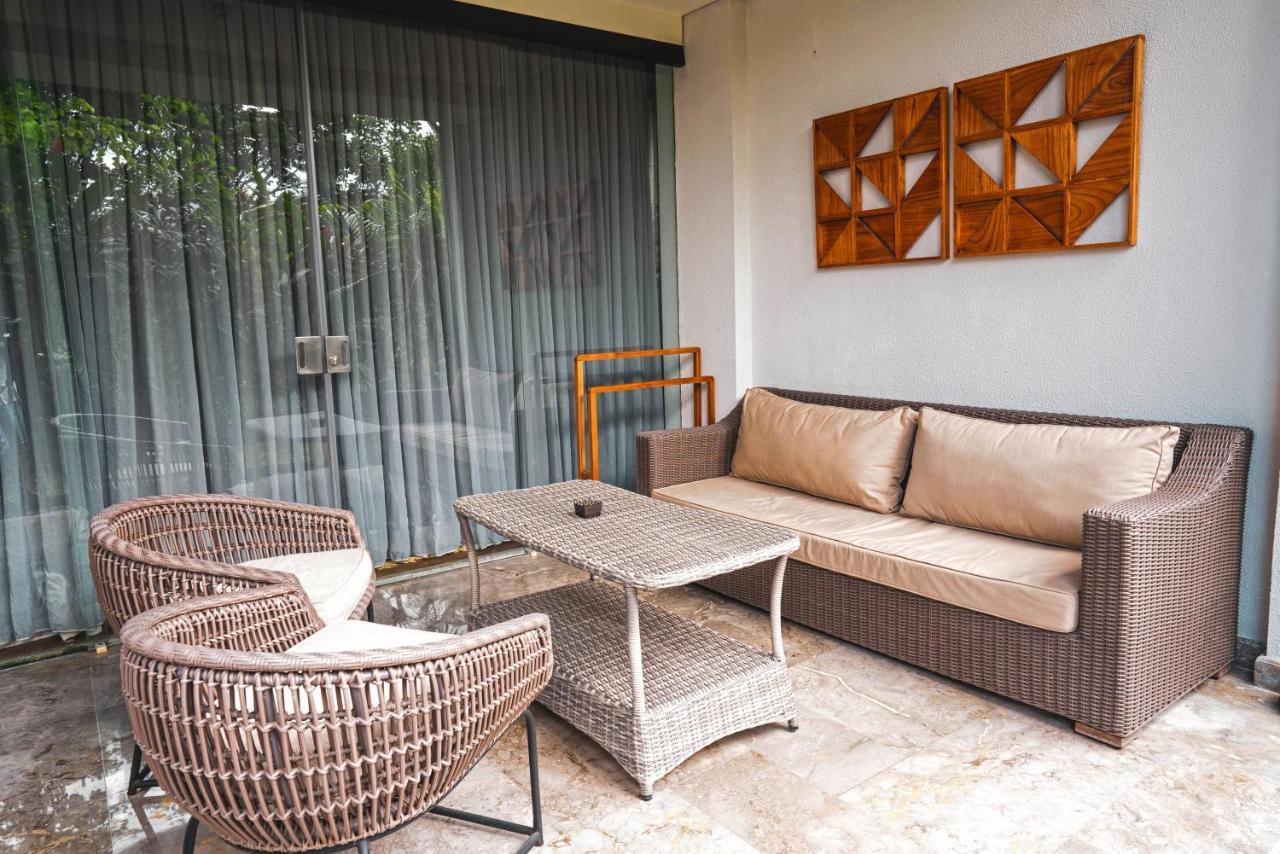 Goya Boutique Resort Ubud Exterior foto A rattan furniture set